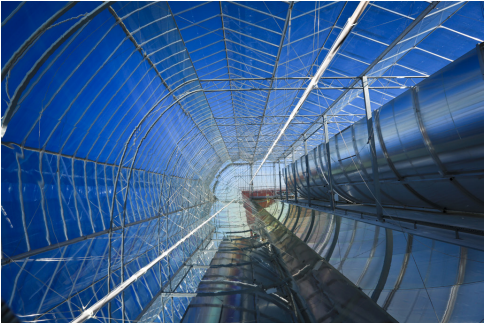 View from inside the enclosed-trough parabolic solar mirrors, used to concentrate sun and generate steam for enhanced oil recovery (EOR)
